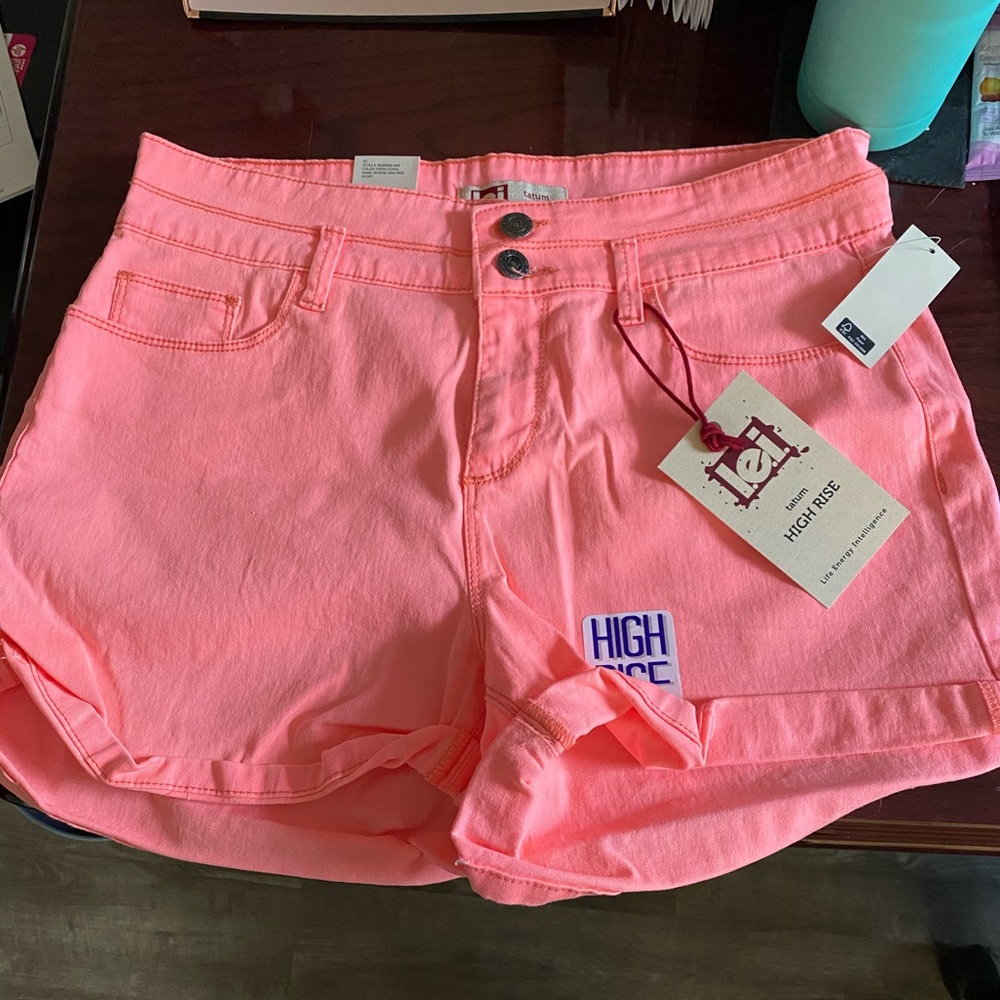 High rise coral shorts.